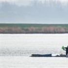 Rescuers to use air cushions in latest effort to save stranded whale