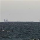 Iran says Strait of Hormuz is 'open' but tracking shows few ships moving