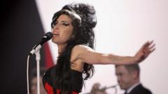 Amy Winehouse's dad loses court case over auction