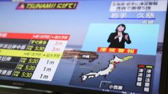 Japan on high alert for 'huge' second quake after issuing tsunami warning