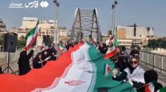 Watch: Iranians form human chains at bridges and power plants