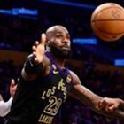 James shines for Lakers while Wembanyama concussed