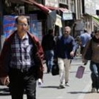 Daily life in Tehran continues - but money is short and risk of war looms