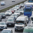People walk along motorway towards Dublin Airport as fuel protests continue