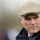 Grand National trainer jailed for beating man with hockey stick