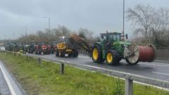 Fuel protesters in tractors disrupt Belfast traffic