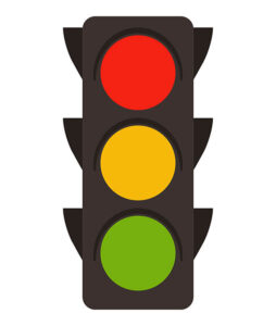 traffic signal with red, yellow, and green lights
